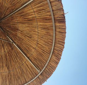 Low angle view of wood against clear sky