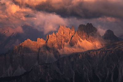 Scenic view of mountain range against sky during sunset