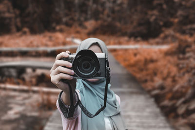 Man photographing with camera