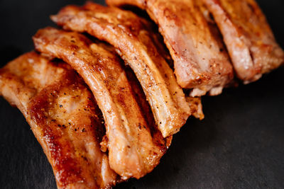 Close-up of meat on barbecue grill