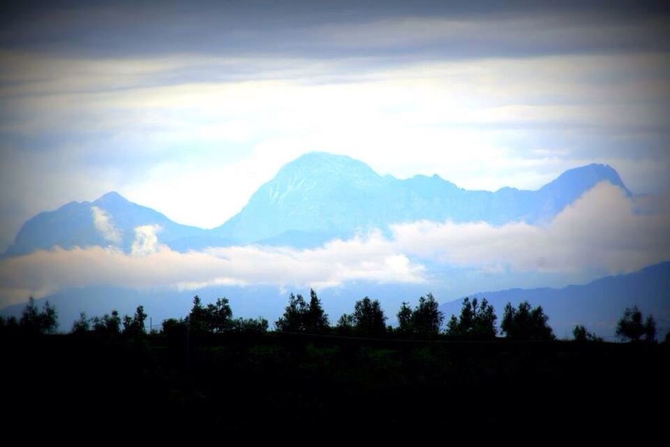 mountain, tranquil scene, scenics, tranquility, mountain range, sky, beauty in nature, landscape, cloud - sky, nature, tree, silhouette, cloud, idyllic, cloudy, non-urban scene, outdoors, no people, sunset, non urban scene