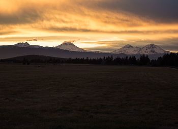 Scenic view of mountains against sky during sunset