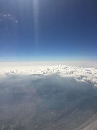 Aerial view of clouds over blue sky