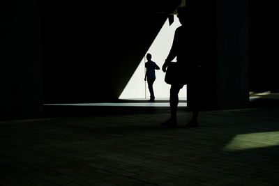 Silhouette man standing on stage