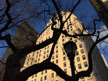 Low angle view of buildings against blue sky