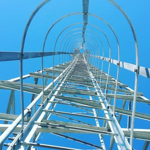 Low angle view of metallic structure against sky