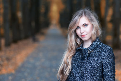 Portrait of a teenage girl standing outdoors