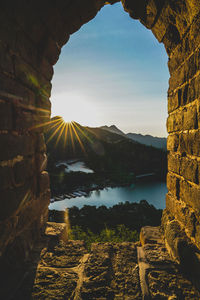 Scenic view of mountain against sky during sunset