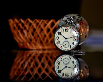 Close-up of old pocket watch