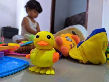 Boy playing with toy at home