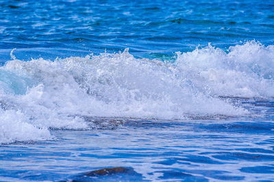 Waves splashing on swimming pool