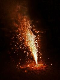 Firework display at night