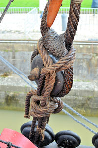 Close-up of rope tied on metal