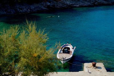 High angle view of boat sailing in sea