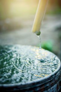 Close-up of water drops on fountain