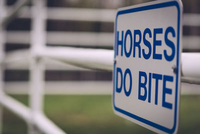 Close-up of text on glass