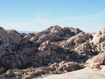 Scenic view of rocky mountains against sky