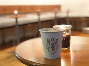 Close-up of coffee cup on table