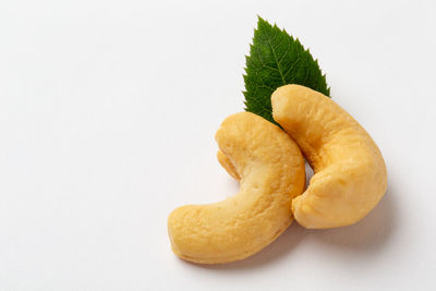 Close-up of banana against white background