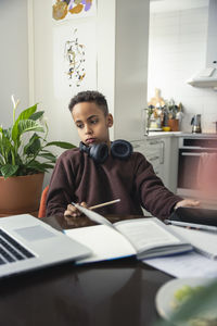 Boy doing homework at home