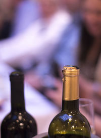 Close-up of beer glass bottle on table