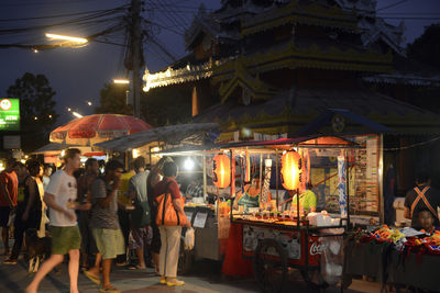 People at street market during night