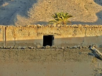 Built structure on wall of old building