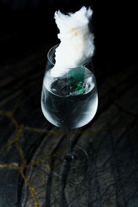 Close-up of wineglass on table