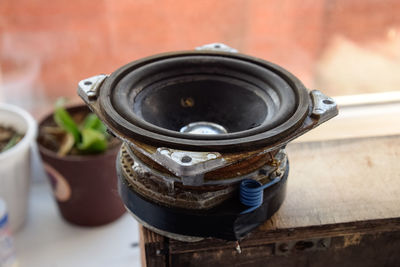 High angle view of old tea cup on table