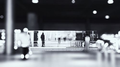 Woman standing at night