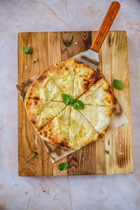 Close-up of pizza on cutting board