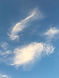 Low angle view of clouds in blue sky