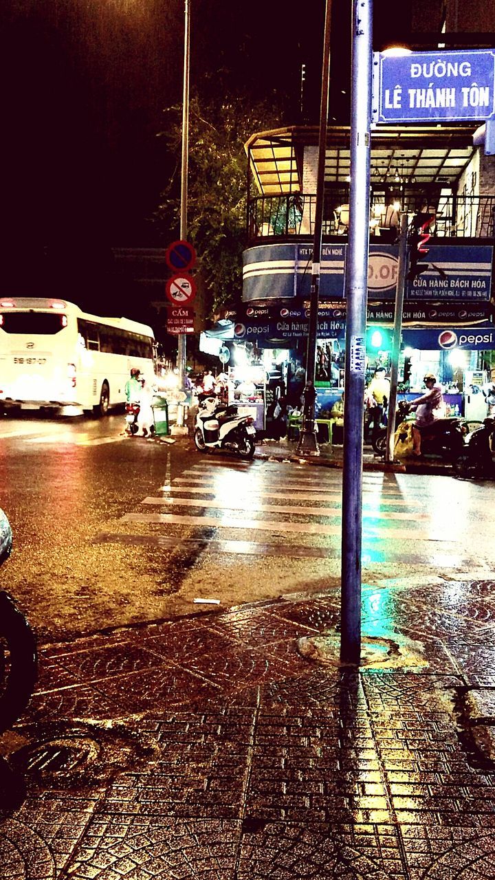 VEHICLES ON ROAD AT NIGHT