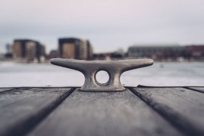 Close-up of cleat on pier