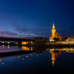 Illuminated buildings in water