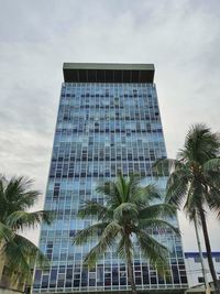 Low angle view of modern building against sky