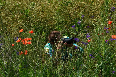 High angle view of girl playing on field