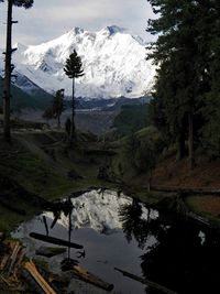 Scenic view of landscape with mountain range in background