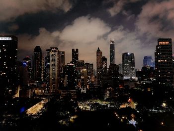 Illuminated buildings in city at night