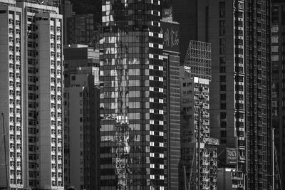 Low angle view of modern buildings in city at night