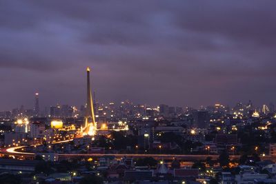 Illuminated buildings in city at night