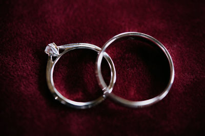 Directly above shot of wedding rings on table