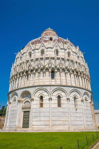 Low angle view of building against blue sky