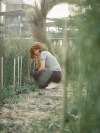 Side view of woman on land