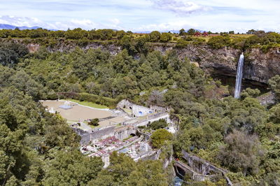 High angle view of plants and trees against sky