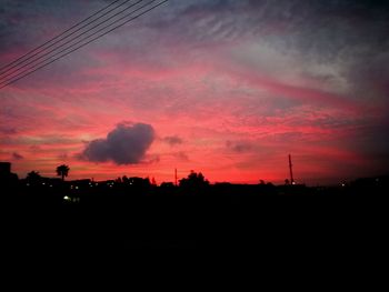 Silhouette landscape against sky during sunset