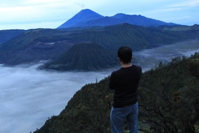 Man standing on landscape