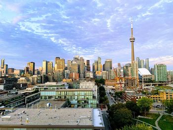 Modern buildings in city against sky