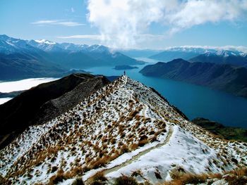 Scenic view of mountains against sky during winter