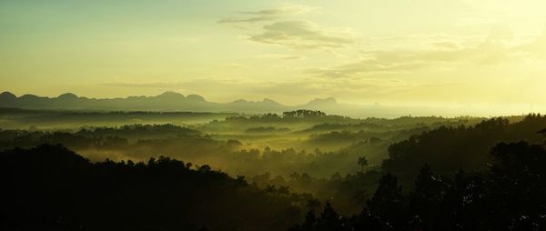 Scenic view of silhouette landscape against sky during sunset